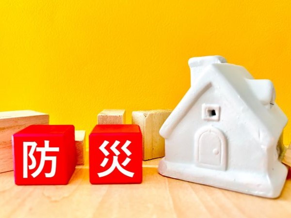 家の模型と防災と書かれたブロック